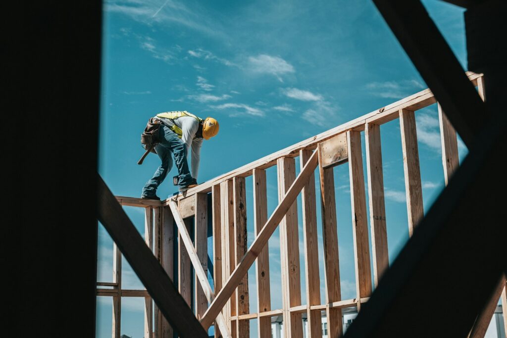 Construction worker on a steel building frame