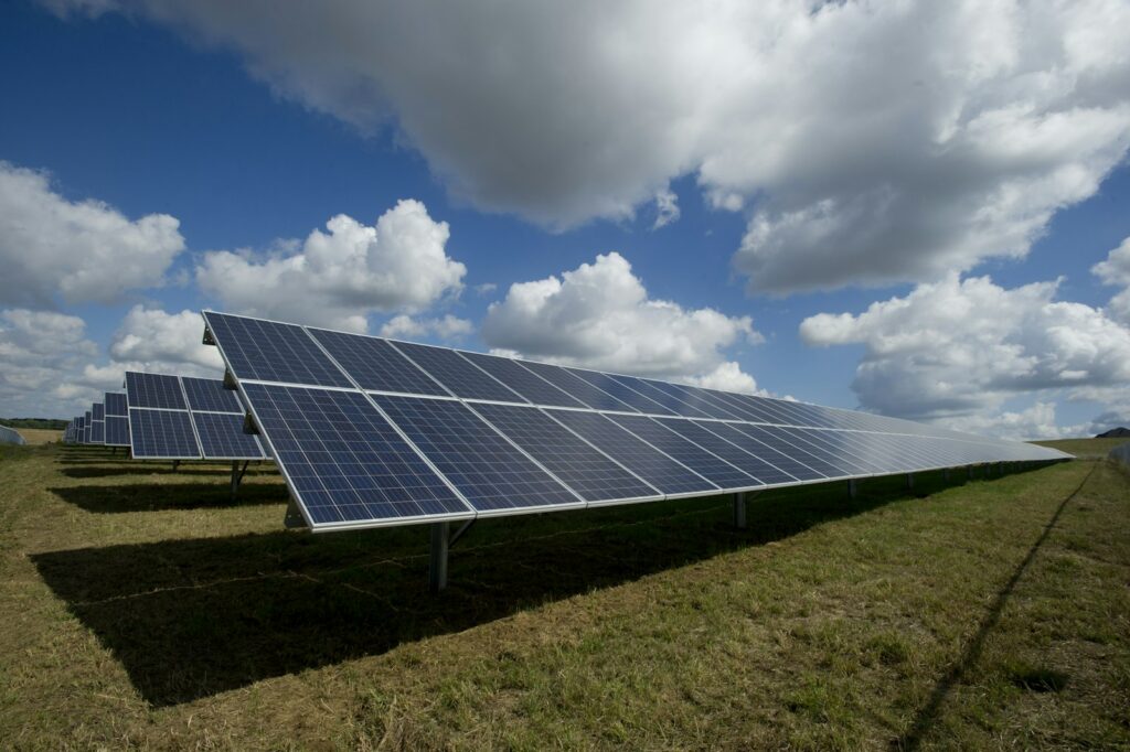 Solar panels on a green field