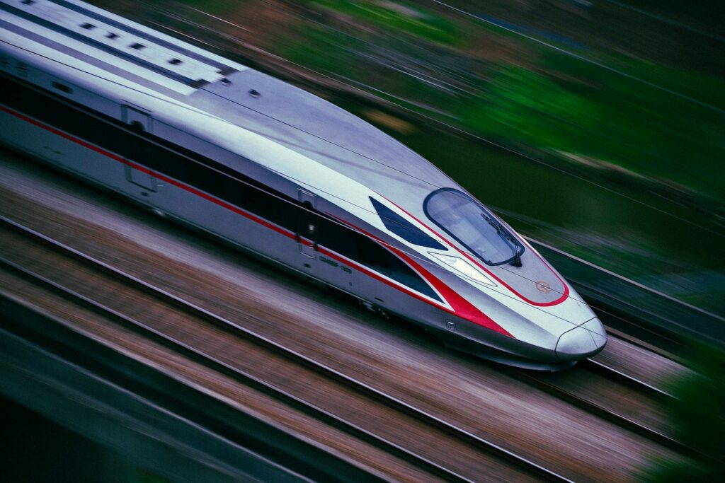Modern passenger train on railway tracks
